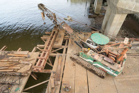 Old mobile crane in constructionの写真素材