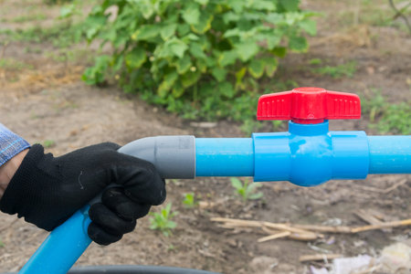 Plumber open water valve PVC pipe