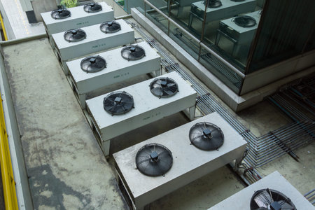 Condensing unit on top of building