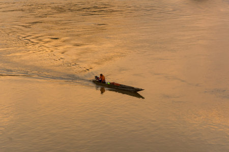 Fisherman has a boat on Mekong river