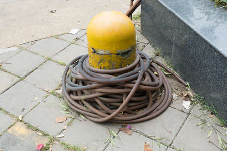 Old rubber tube on floorの写真素材