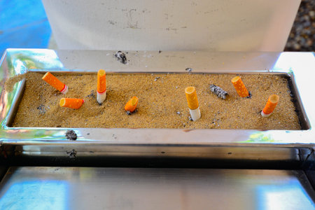 Ashtray of cigarette buttsの写真素材