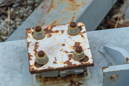 Steel bolt with rusty steel plateの写真素材