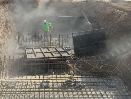 Labor working at construction siteの写真素材