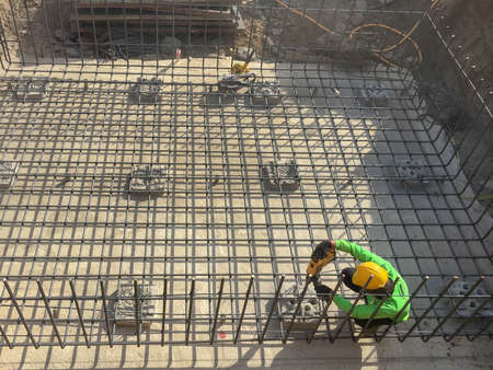 Labor working at construction siteの写真素材
