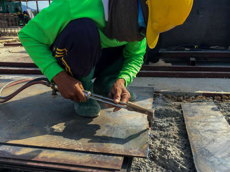 Labor working at construction siteの写真素材