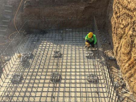 Labor working at construction siteの写真素材