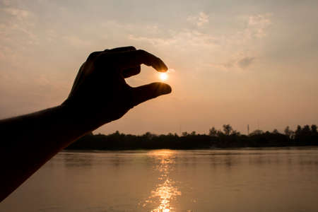 Touch the sunの写真素材