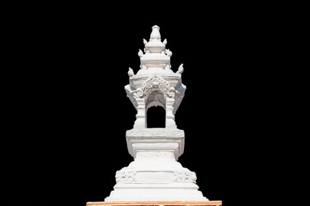 White pagoda on black background