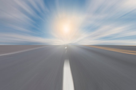 Empty asphalt blurry road with sky and sunlight
