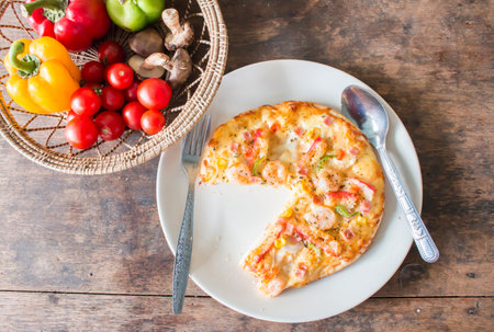 Delicious slice pizza on white dishの写真素材