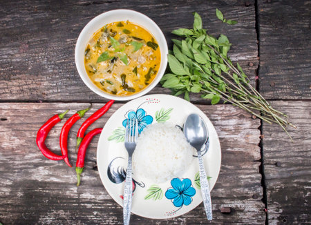 Green curry on wooden backgroundの写真素材