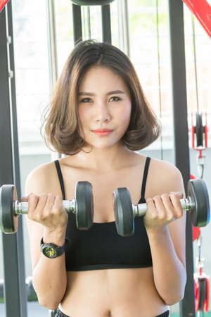 Sporty young women exercising at fitness ,training and lifestyle conceptの写真素材