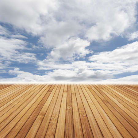 wood floor and cloud sky backgroundの写真素材