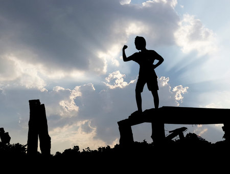 Silhouette of boy on wooden bridge,for you concept design