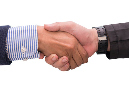 Two business men shaking hands on white background,close upの写真素材