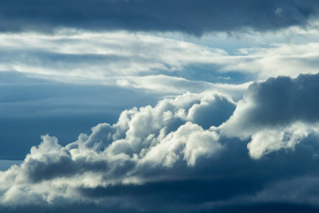 Dark storm clouds on evening sky,nimbusの写真素材