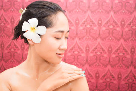 Beauty Spa Woman with perfect skin Portrait.  Gestures for advertisementの写真素材