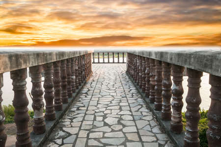 Concrete walkway with cloud sky backgroundの写真素材