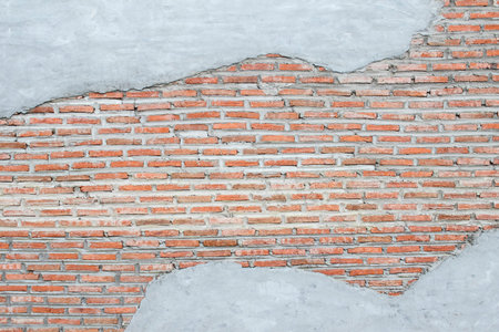 destroyed concrete and brick wall backgroundの写真素材