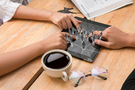 Group of friends having fun together with tablet,Technology addiction concept, Closeup of hands...