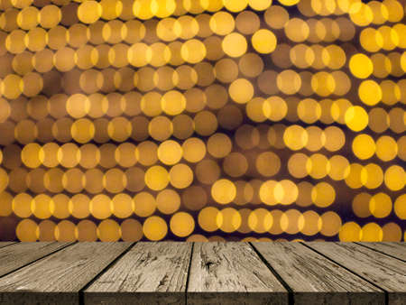 Festive wooden background with  bokeh lightの写真素材