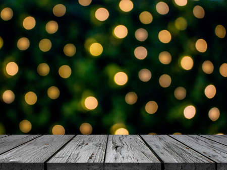 Festive wooden background with  bokeh lightsの写真素材