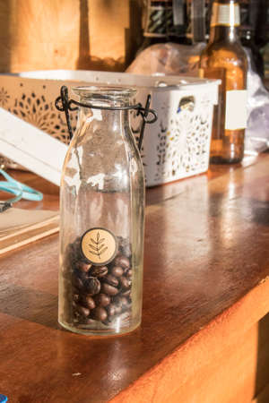 coffee bean in glass bottleの写真素材