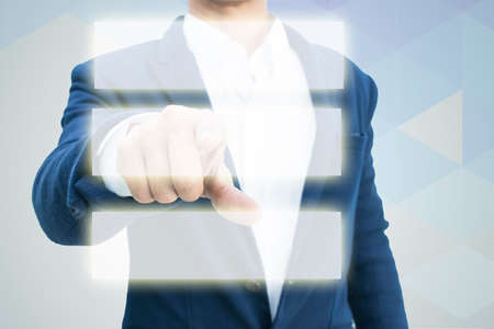 Businessman pressing empty  buttonの写真素材