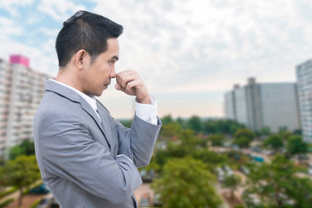 Beside asian business man on building background