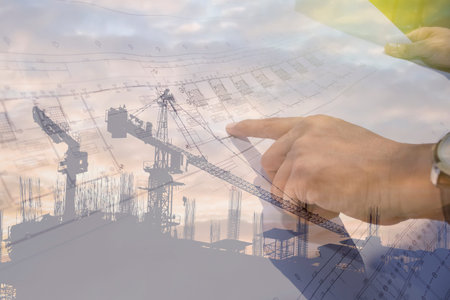 engineer hand working on  architectural project,double exposure