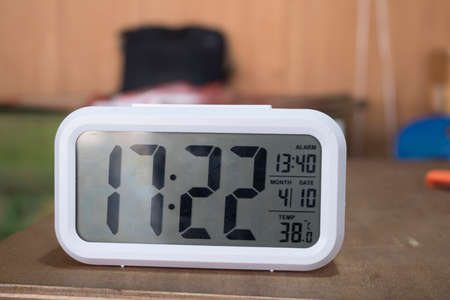 Digital Alarm Clock on the tableの写真素材