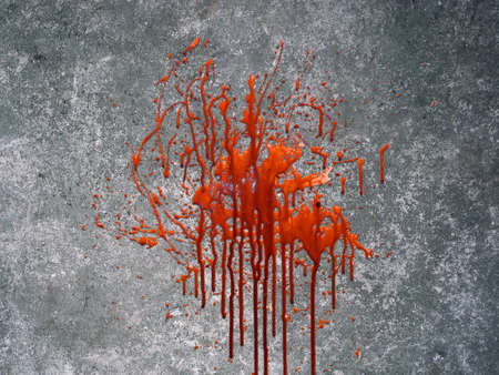 Blood splatter on concrete wallの写真素材