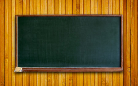Blank old blackboard on wooden backgroundの写真素材