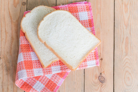 Two slice bread on napkin,food background