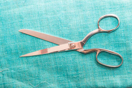 the tailor's scissors on fabric,top viewの写真素材
