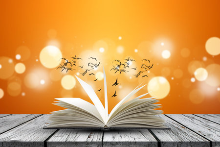 Vintage open book  on table with bird flying on blurry  background,Education concept