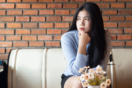 portrait asian girl posing in cafe