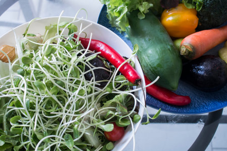 Fresh sunflower sprouts  in kitchen,Vegetable salad, Healthy food