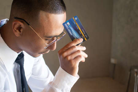 Portrait of business man with cradit cardの写真素材