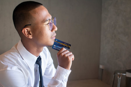 Portrait of business man with cradit card