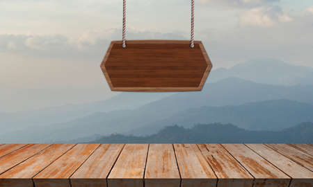 Wood terrace with hanging wood board on mountain backgroundの写真素材