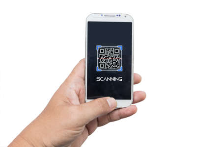 Online shopping concepts with youngbusinessman using smartphone with qr codeの写真素材