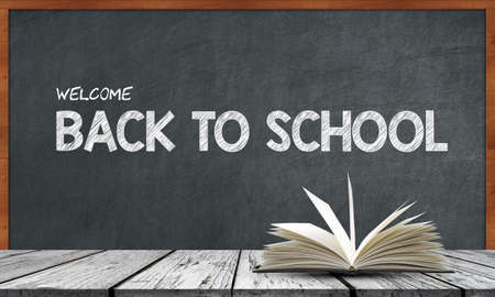 Book in front of school black board .Back to school, education, learning concepの写真素材