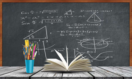 Book in front of school black board .Back to school, education, learning concepの写真素材