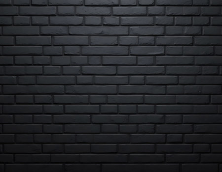 Seamless black brick wall texture with a matte dark surface and sleek finish, suitable for modern or industrial visual designsの素材