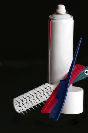 hair care made easy with combs, brush and hair sprayの写真素材