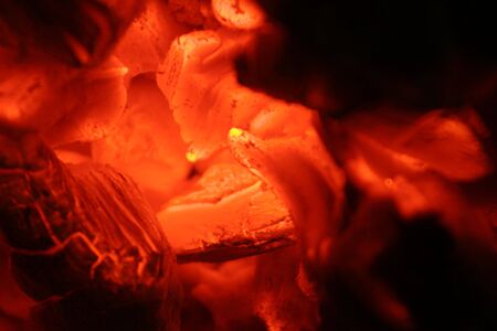 tip of the fire glows yellow red in the intense heatの写真素材