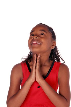 young African American looking up as she praysの写真素材