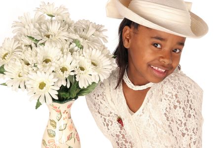 darling young lady with her vase full of daisiesの写真素材